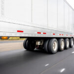 Big,Rig,Powerful,Semi,Truck,Transports,A,Heavy-duty,Four-axle,Semi